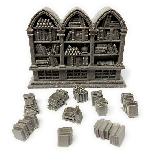 A bookcase, filled to the brim with books, produced by Legend Games. Used with the unfilled bookcase and you can create a library set piece. Comes unpainted.